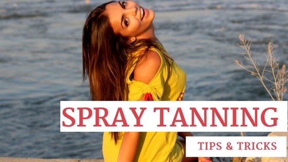 Tan Woman by a Lake with text that says spray tanning tips and tricks